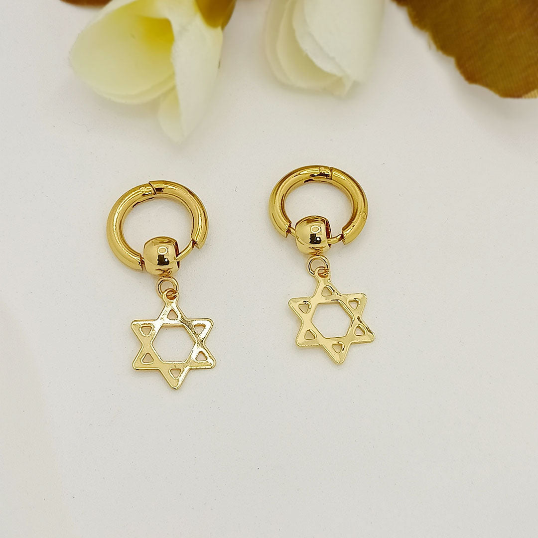 Gold star dangle earrings