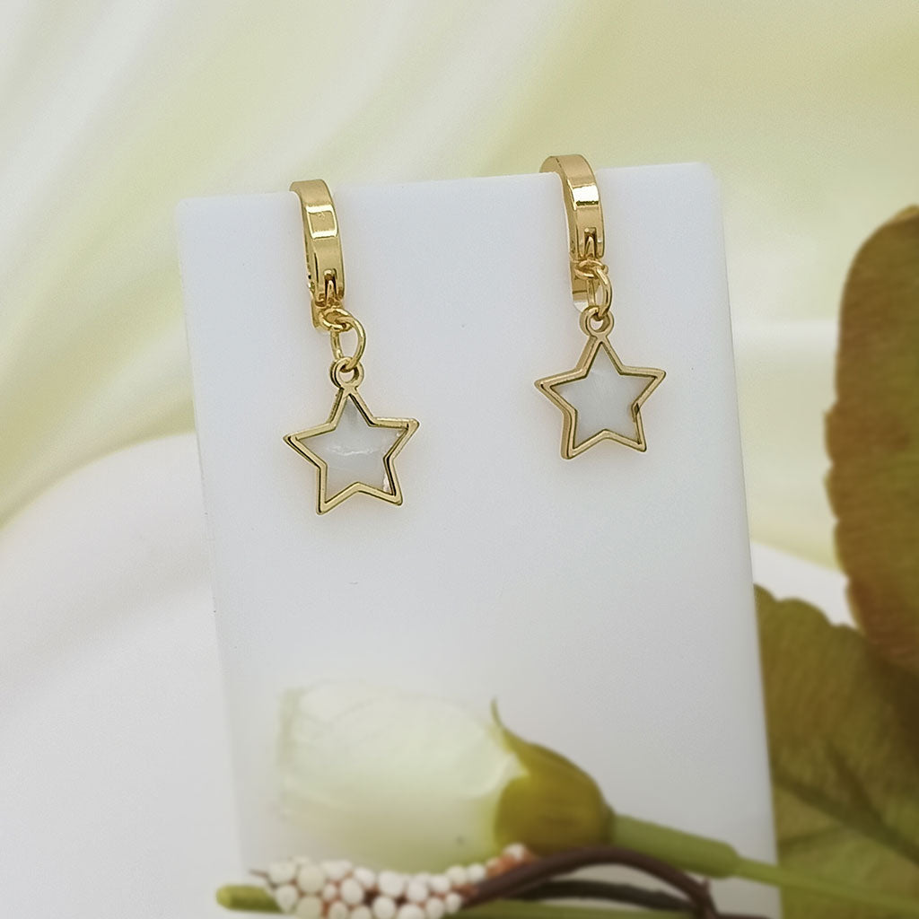 Gold star dangle earrings