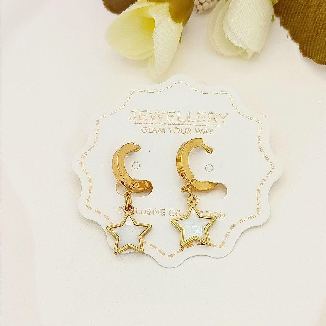 Gold star dangle earrings