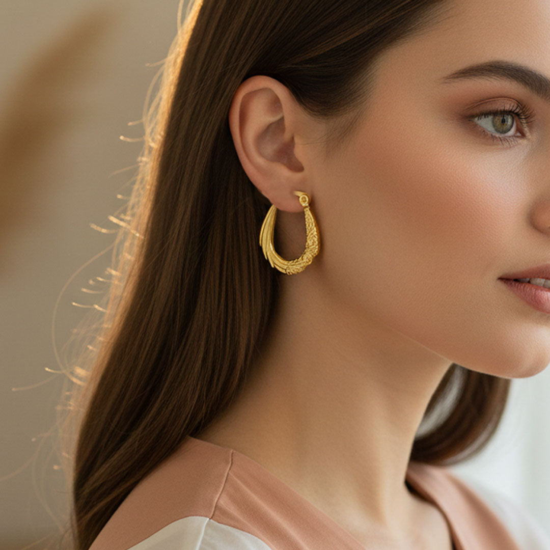 Engraved gold-toned hoop earrings