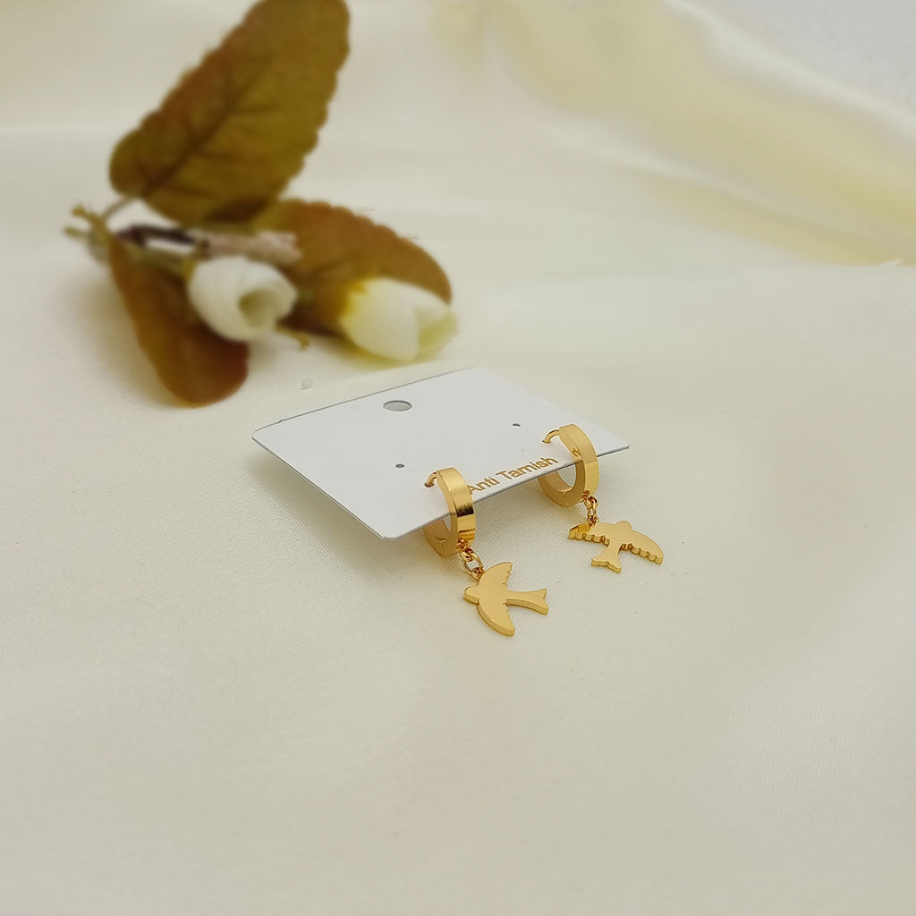 Gold bird drop earrings