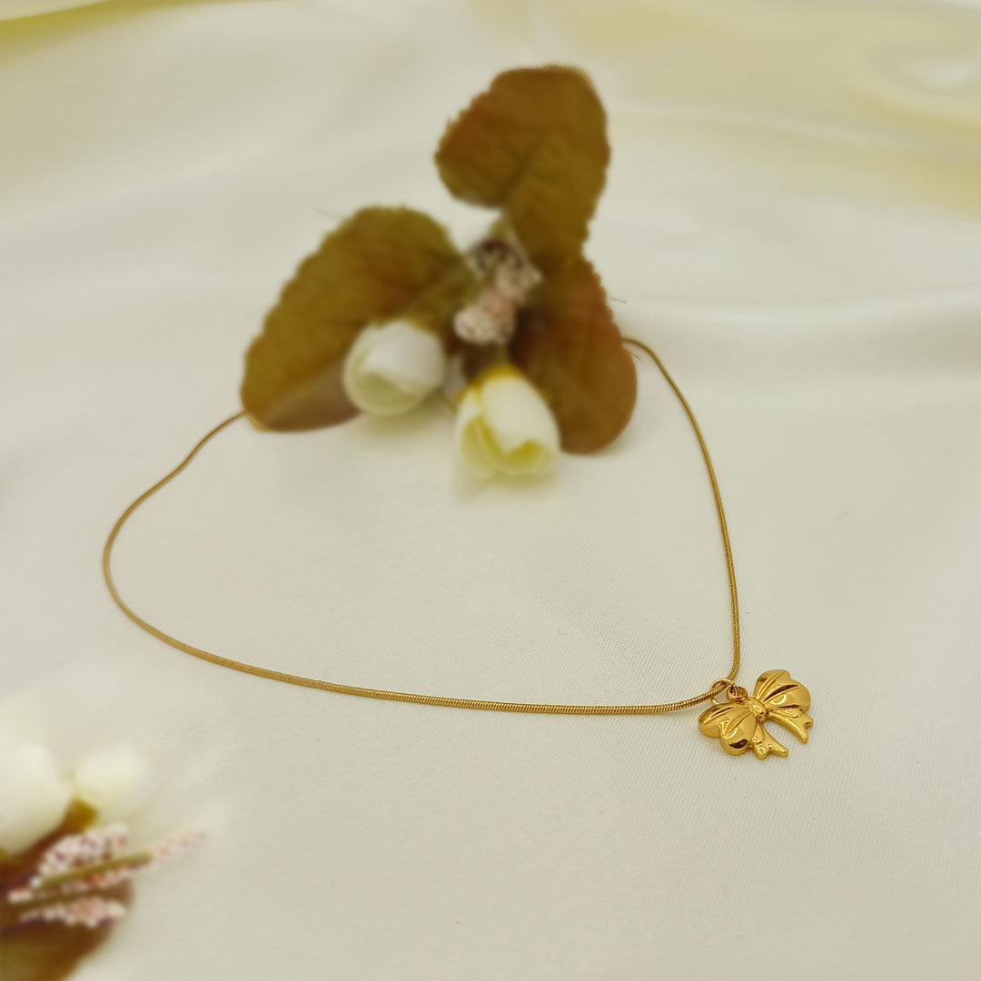 Gold Bow Pendant Necklace – Elegant Minimalist Jewelry