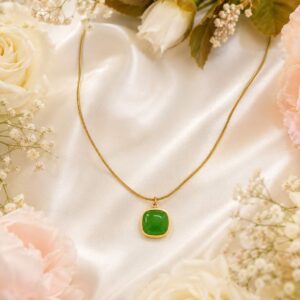 green jade cushion pendant on gold plated chain
