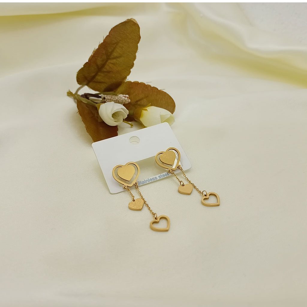 triple heart dangle earrings triple heart dangle earrings